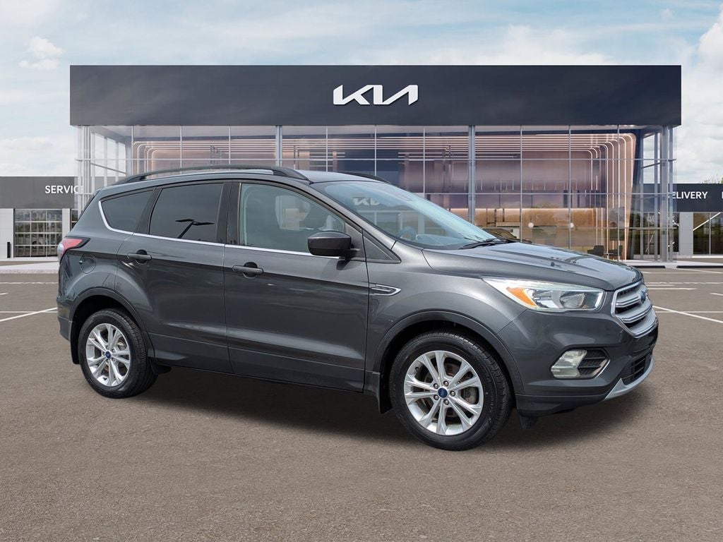 2018 Ford Escape SE in Magnetic — front three-quarter view
