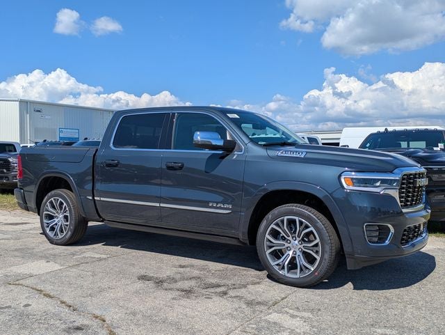 2026 RAM Ram 1500 RAM 1500 TUNGSTEN CREW CAB 4X4 in Forged Blue Metallic Exterior Paint — front three-quarter view