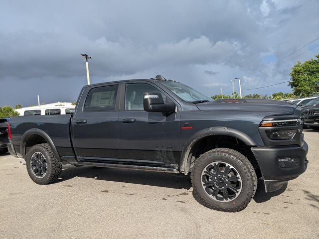 2025 RAM Ram 2500 RAM 2500 REBEL CREW CAB 4X4 6'4' BOX in Forged Blue Metallic Exterior Paint — front three-quarter view