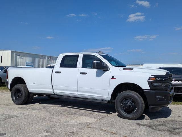 2026 RAM Ram 3500 RAM 3500 TRADESMAN CREW CAB 4X4 8' BOX in Bright White Clear-Coat Exterior Paint — front three-quarter view