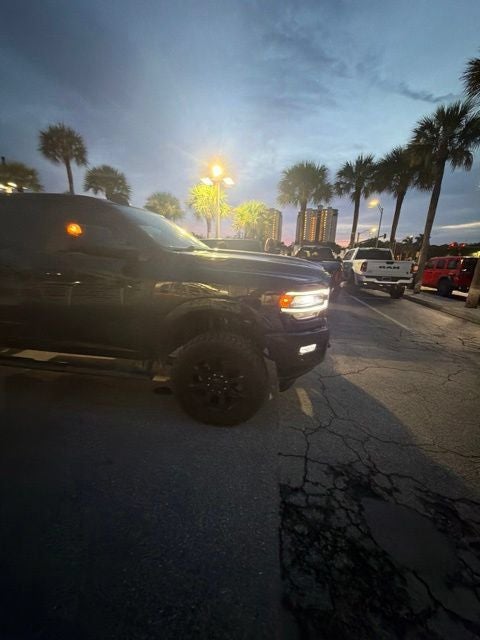 2022 RAM 2500 Laramie Crew Cab 4x4 6'4' Box in Diamond Black Crystal Pearlcoat — front three-quarter view
